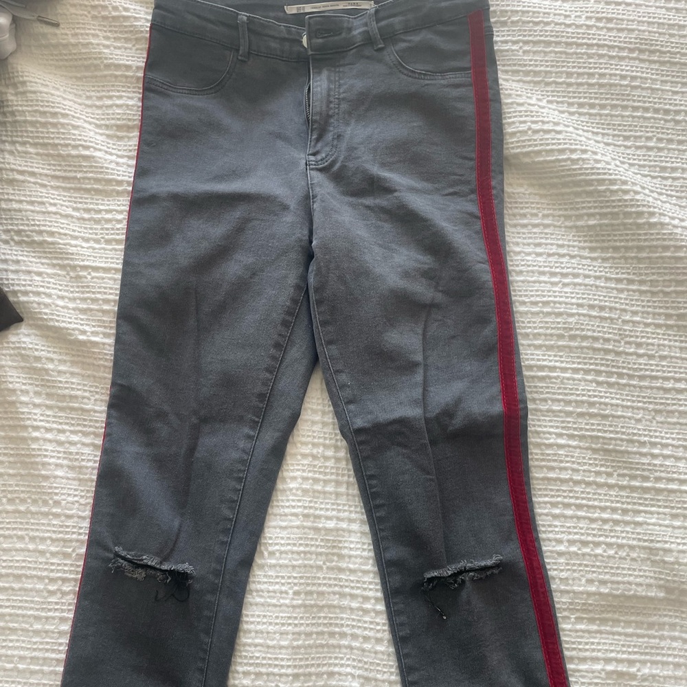 Zara leggings with raw edges and a rip in the leg